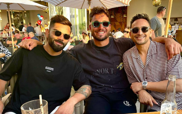 Virat Kohli with Marcus Stoinis